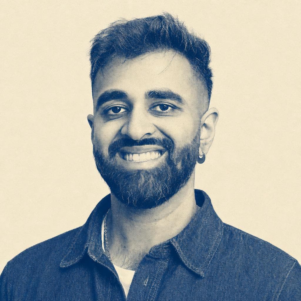 Samraaj Singh Bath, smiling in a denim jacket.